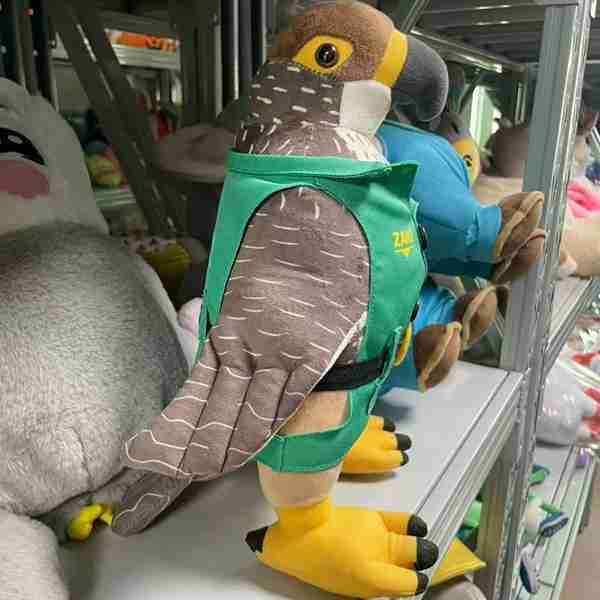 Plush toy with removable clothes